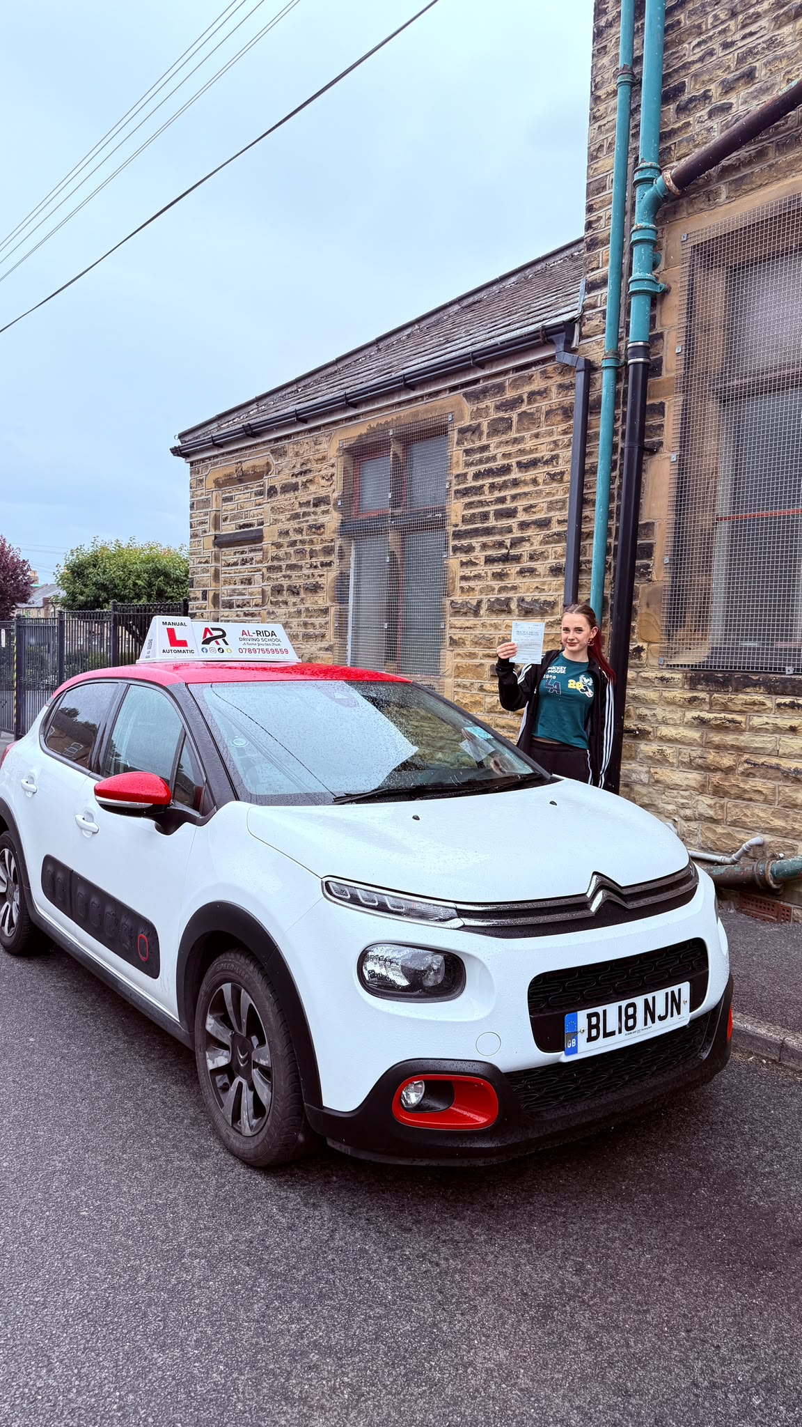 Student passing driving test with Al-Rida Driving School in dewsbury, wakefield, batley, mirfield, ossett, morley and surrounding areas