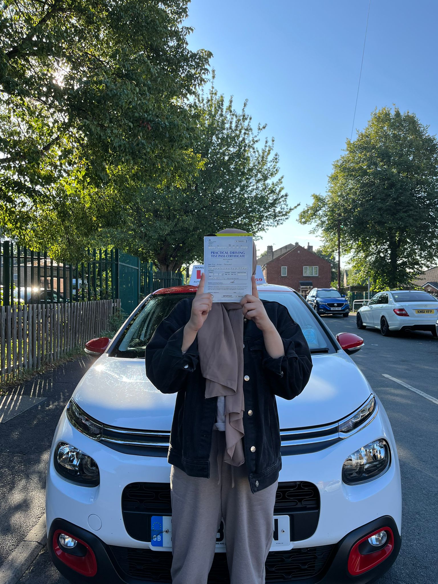 Student passing driving test with Al-Rida Driving School in dewsbury, wakefield, batley, mirfield, ossett, morley and surrounding areas